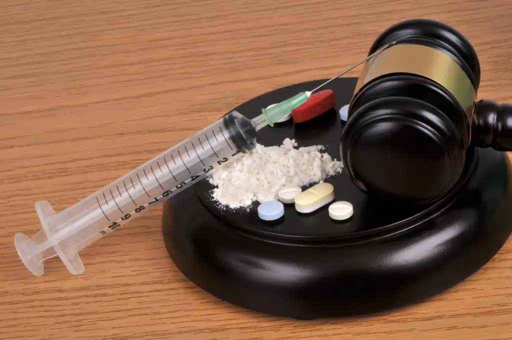 An image of various societal impacts of substance abuse, including health, economic, and social effects