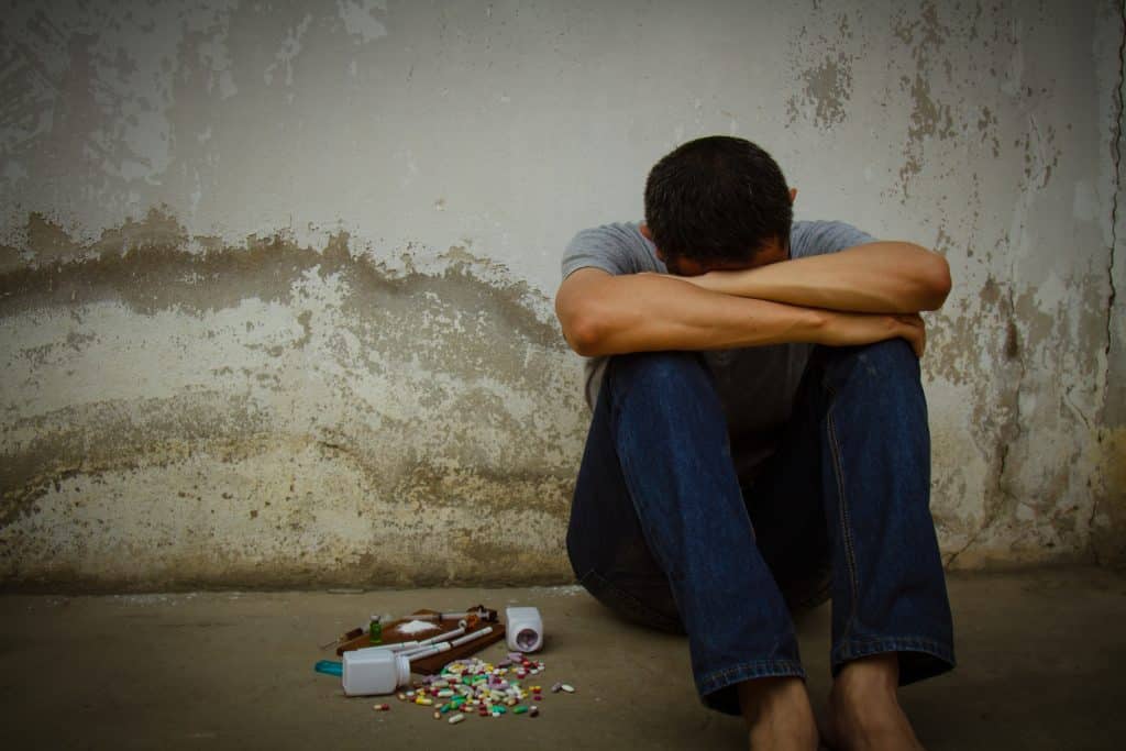 Visual depiction of opioid addiction, including the effects on the body and mind, and the challenges of overcoming dependency.