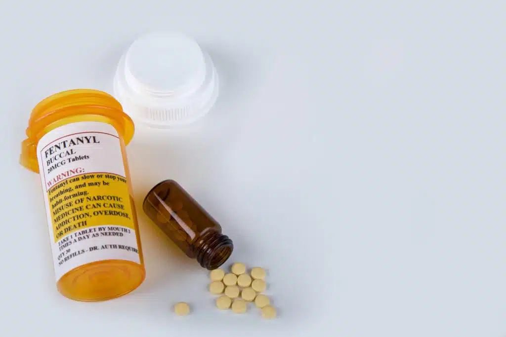 Graphic listing the warning signs of painkiller addiction, including physical and behavioral symptoms.