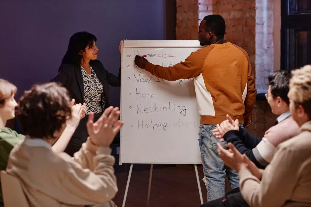 Participants engaging in activities during a long-term rehab program.