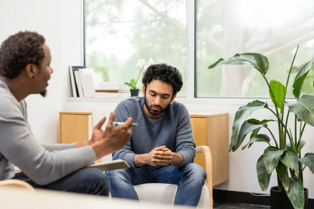 A therapist conducting a behavioral therapy session with a patient
