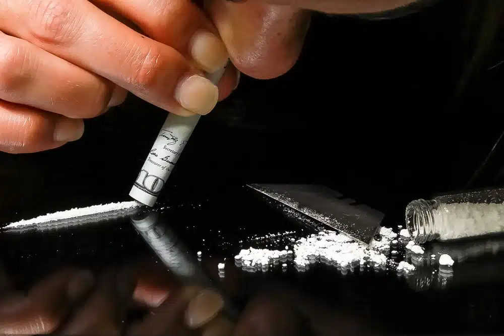 Cocaine abuse and usage patterns among drug addicts, including methods of consumption and its effects.