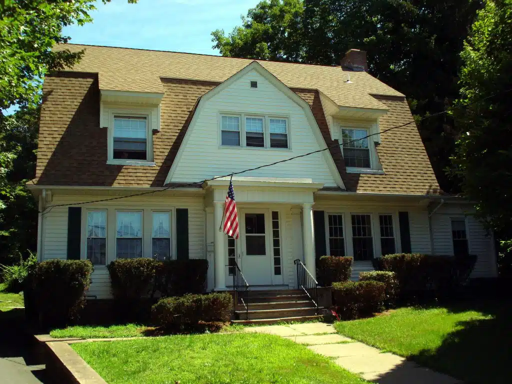 Exterior view of BHcare Harbor House facility in Branford, CT, specializing in supportive recovery services.
