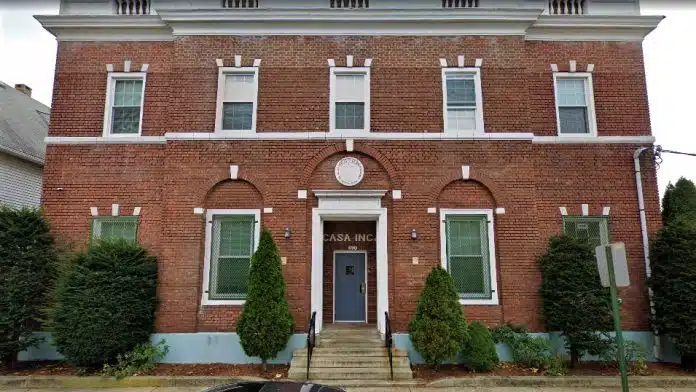 Exterior view of CASA Eugenio Maria de Hostos facility in Bridgeport, CT, specializing in community support services.