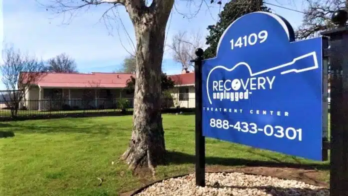 Exterior view of Recovery Unplugged facility in Austin, TX, specializing in music-based addiction treatment services.