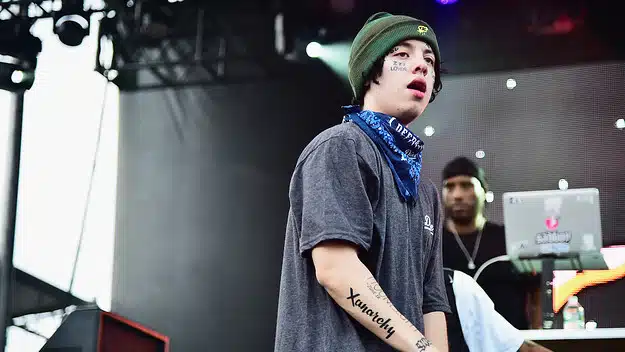 Lil Xan speaking about his struggle with addiction and recovery, emphasizing the dangers of prescription drug abuse.