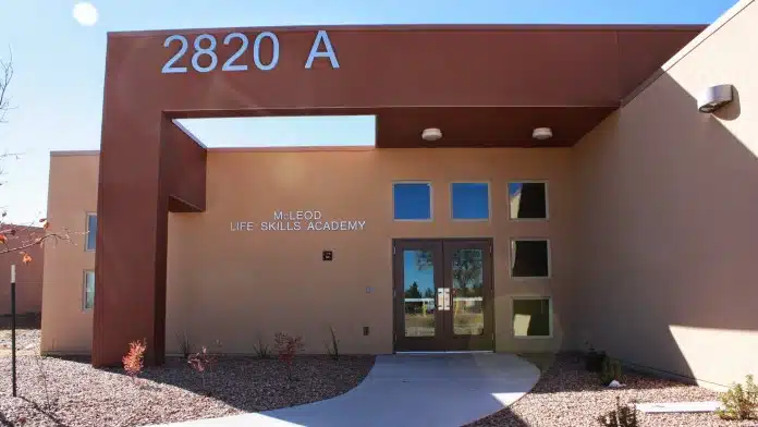 Exterior view of New Day Youth & Family Services, a support facility located in Albuquerque, NM.