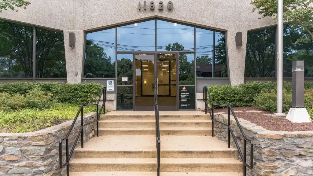 Exterior view of Sandstone Care facility in Rockville, MD.