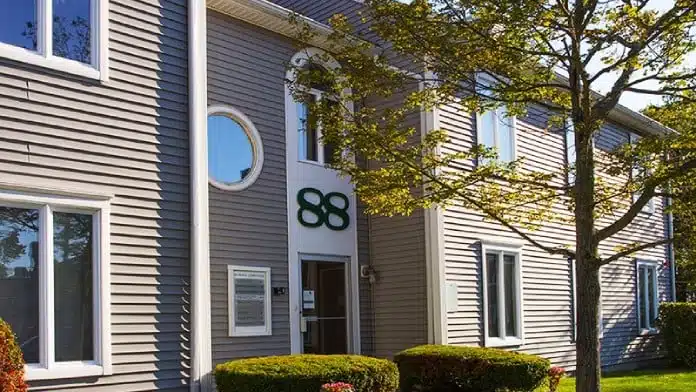 Main entrance of AdCare Outpatient in Dartmouth, Massachusetts, providing addiction treatment services