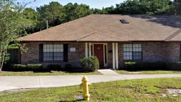 Main entrance of The Village Transitional Housing Program facility in Winter Park, Florida