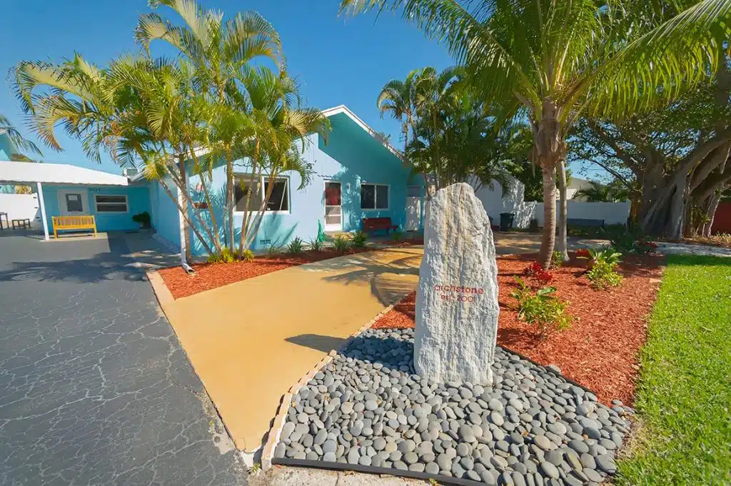 Archstone Behavioral Health outpatient and residential addiction treatment facility with pool and palm‑tree grounds in Lantana (Lake Worth), Florida 33462