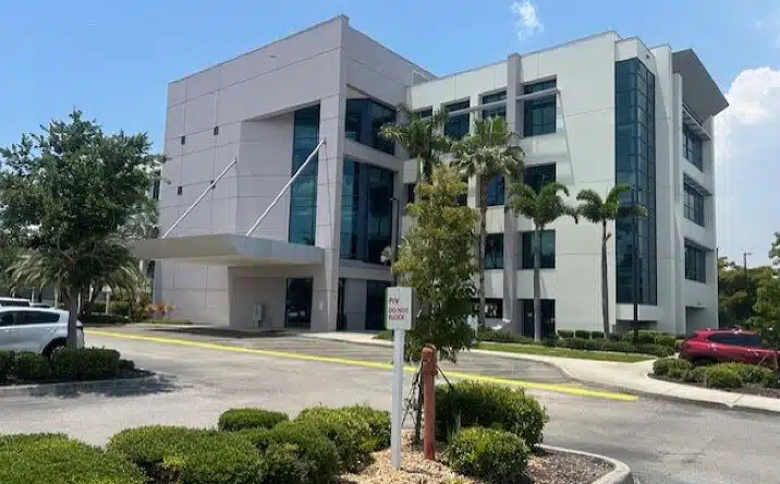 Exterior view of Bayfront Health Behavioral Health Services in Punta Gorda, Florida, offering inpatient and outpatient psychiatric care and mental health services.
