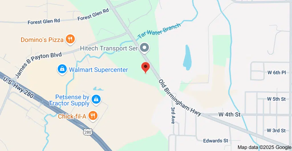 Front entrance of Caradale Lodge at Cheaha Regional Mental Health Center in Sylacauga, Alabama, showing building entry and signage