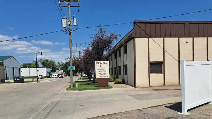 Main entrance of The Centre behavioral health campus in Fargo, North Dakota, showing building entry and name signage