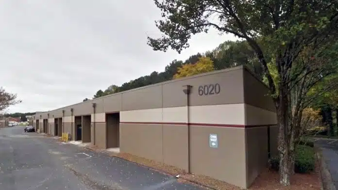Main entrance of the Clinic for Education Treatment and Prevention of Addiction in Norcross Georgia 30093 with front doors and facility signage