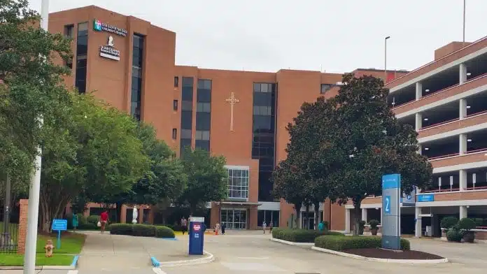 Front entrance of Our Lady of Lake Regional Medical Center in Baton Rouge, Louisiana, showing accessible pathways and main doors