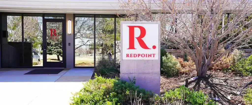 Main entrance of Redpoint Center in Longmont, Colorado, specializing in addiction treatment and recovery services