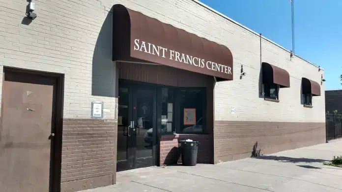 Main entrance of St. Francis Center day services facility at 2323 Curtis Street, Denver, Colorado