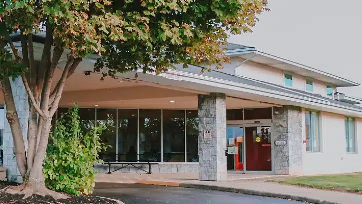 Front entrance of Signature Health Willoughby in Willoughby, Ohio, showing the building exterior and signage.