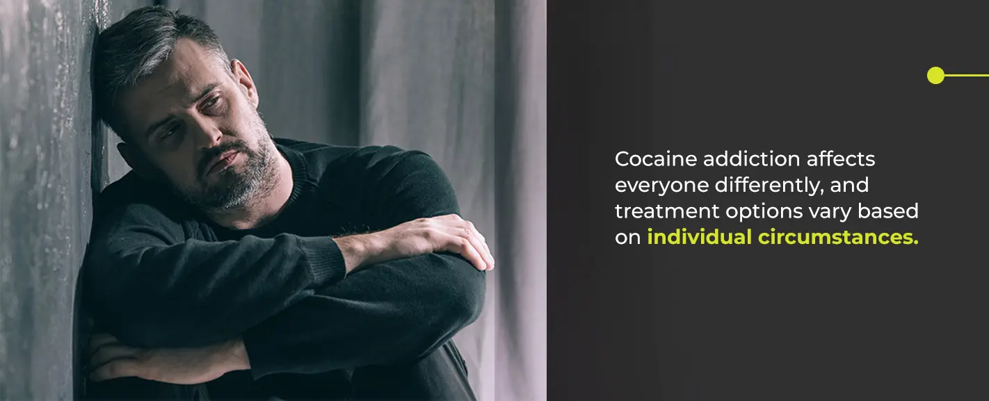 person looking thoughtfully out a window, symbolizing contemplation of change - Cocaine Addiction Treatment