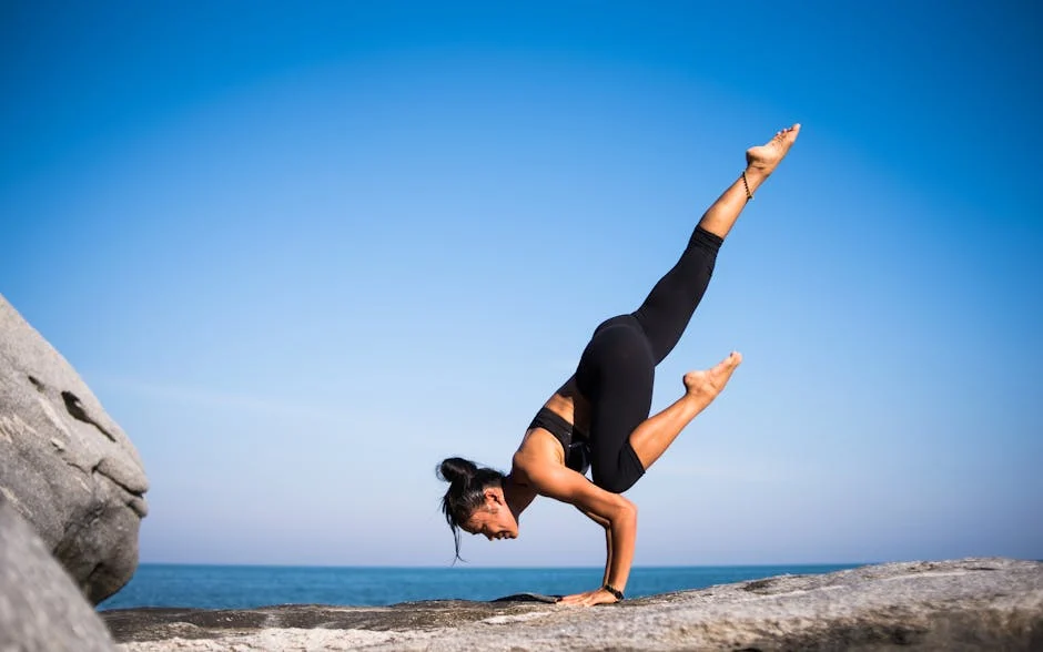 person practicing yoga outdoors - Depression Treatment