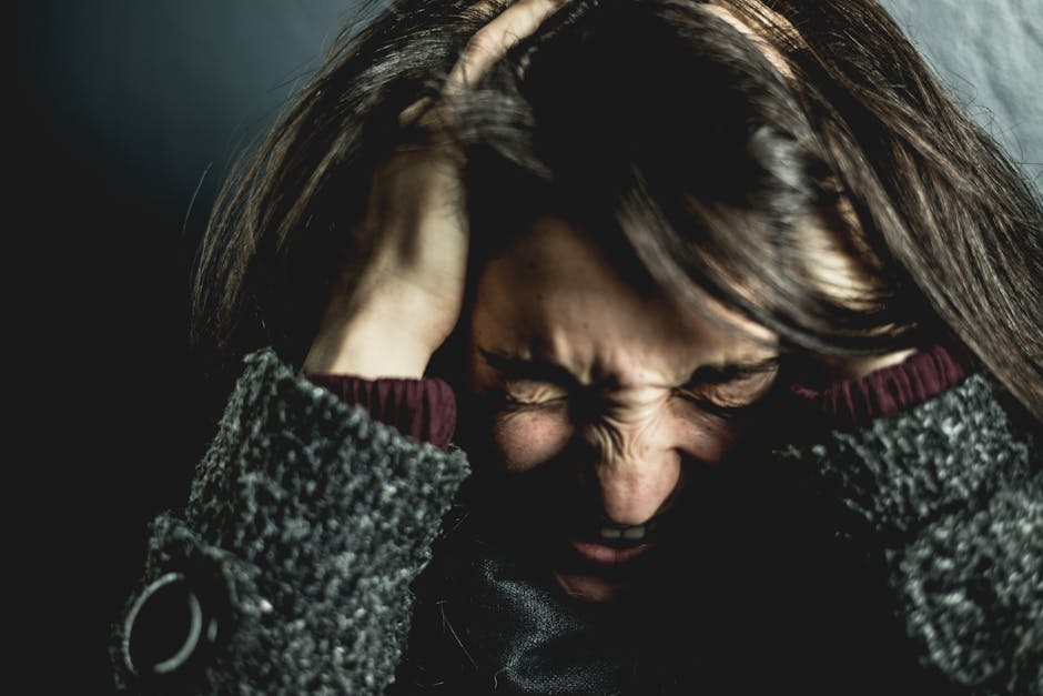 An image illustrating the contrast between psychological distress and physical fatigue, with a person looking tired and anxious - Crack Detox
