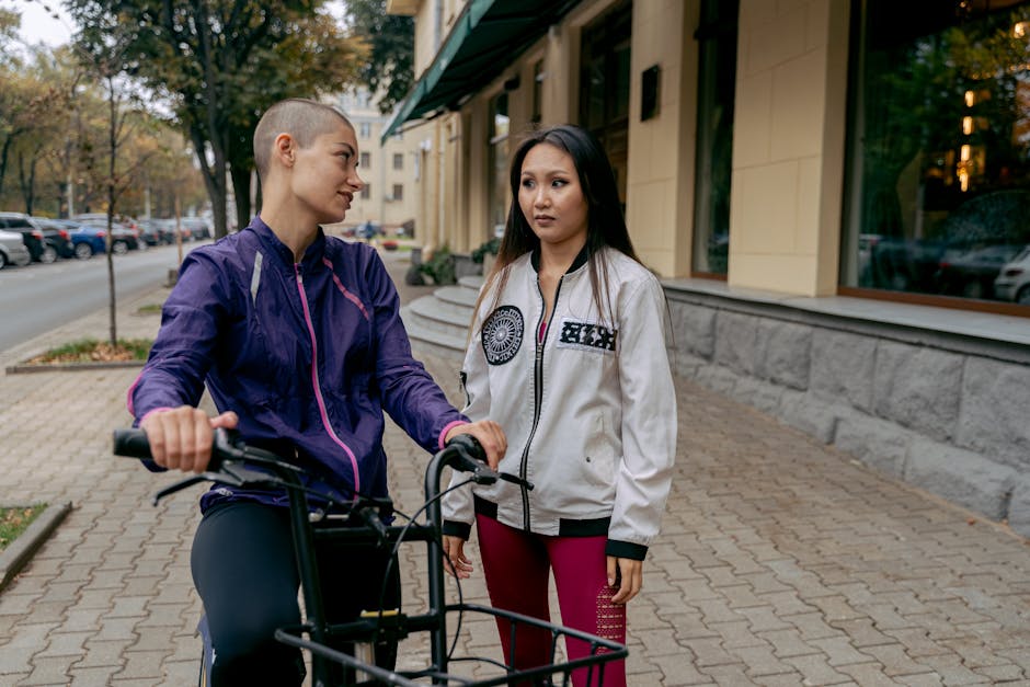 Two people having a supportive conversation on a walk outside, demonstrating connection and ongoing support. - Intensive Outpatient Treatment