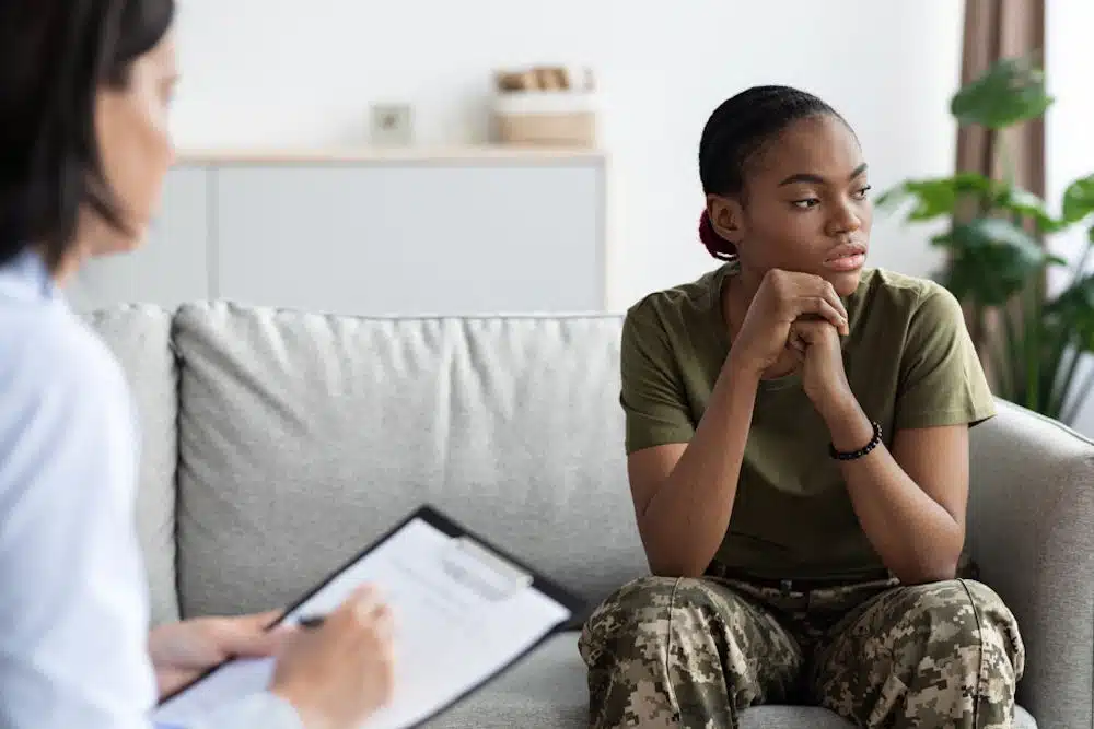 Compassionate therapist talking with a patient - PTSD treatment centers Compassionate therapist talking with a patient - PTSD treatment centers