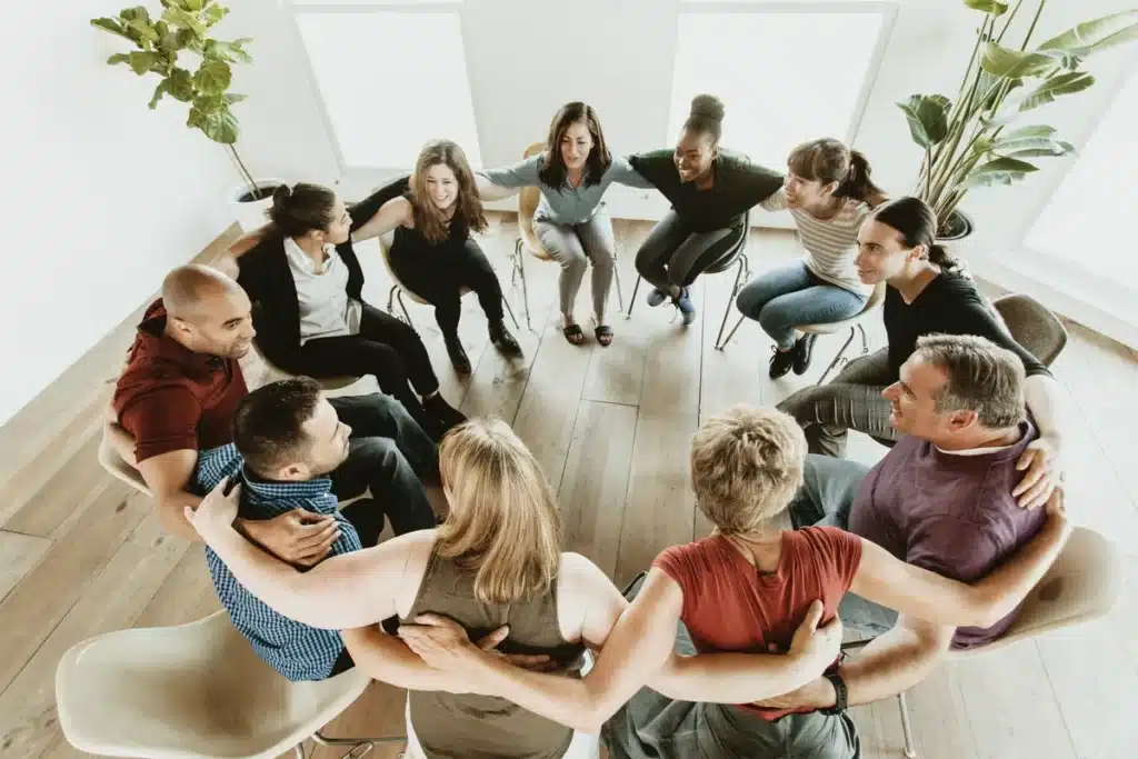 diverse group of people in a support circle - borderline personality disorder therapies a diverse group of people in a group - borderline personality disorder therapies slug