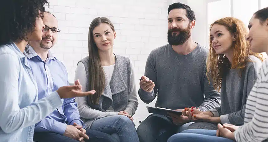 Diverse group of people in a support group meeting - Treatment centers Maryland Diverse group of people in a support group meeting - Treatment centers Maryland