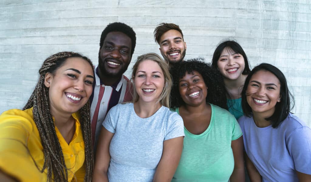 Diverse group of people in a supportive group setting - free methadone clinic near me Diverse group of people in a supportive group setting - free methadone clinic near me