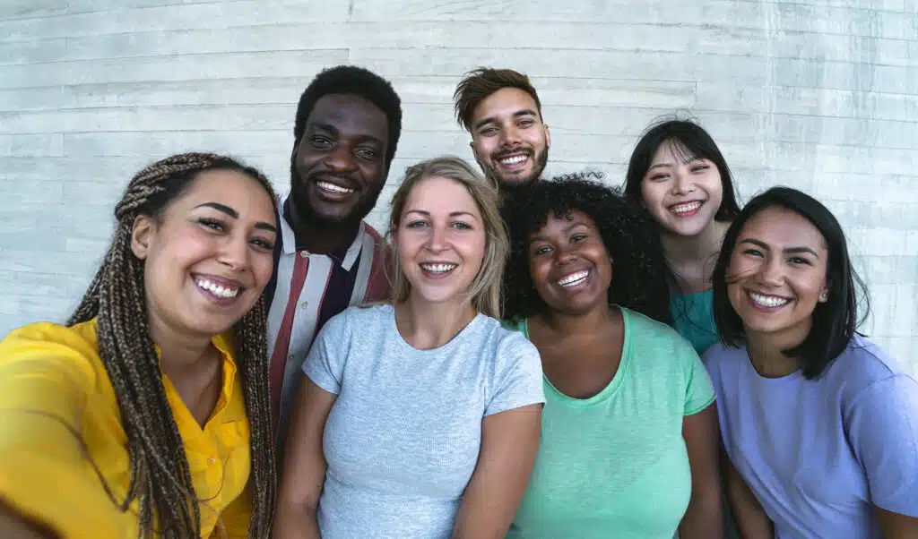 Diverse group of people in a supportive group setting - free methadone clinic near me Diverse group of people in a supportive group setting - free methadone clinic near me