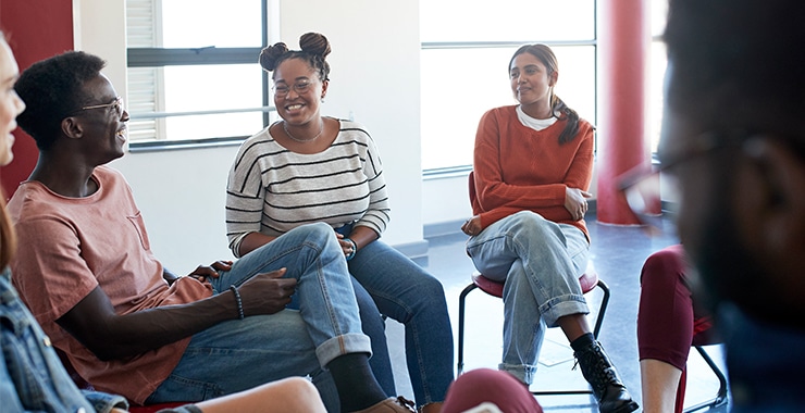 A diverse group of people engaged in a therapy session, actively listening and sharing - Lifewell – Oak 4451 East Oak Street Phoenix, AZ 85008 A diverse group of people engaged in a therapy session, actively listening and sharing - Lifewell – Oak 4451 East Oak Street Phoenix, AZ 85008