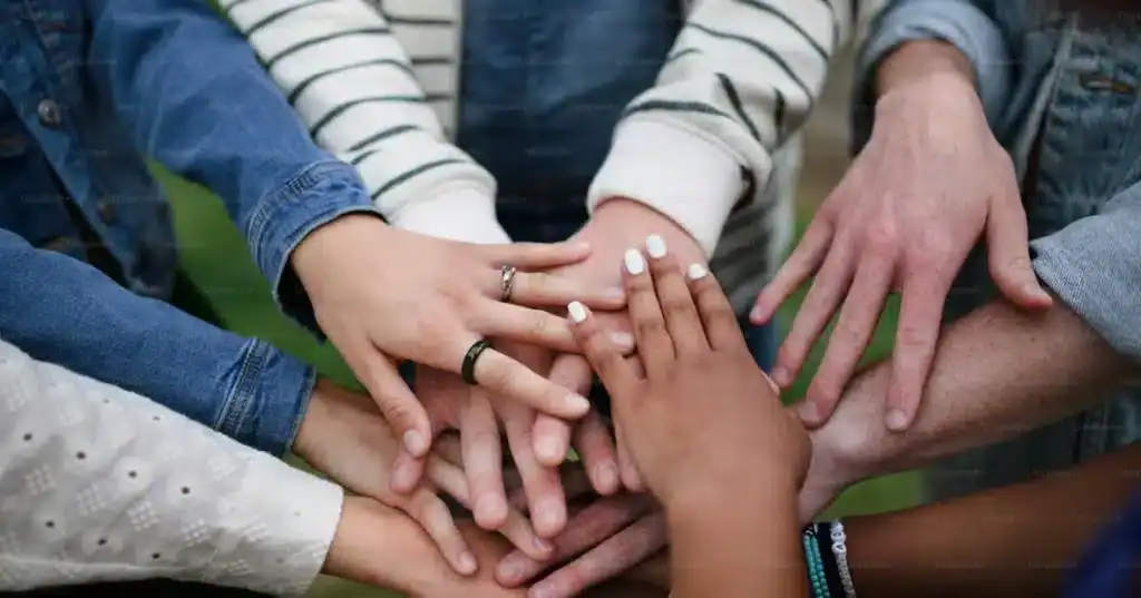 Diverse hands holding each other in a circle of support - closest methadone clinic Diverse hands holding each other in a circle of support - closest methadone clinic