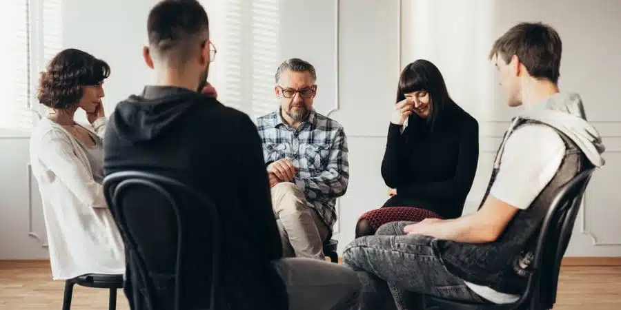 group therapy session in a comfortable, supportive setting - how do residential and outpatient rehab programs compare group therapy session in a comfortable, supportive setting - how do residential and outpatient rehab programs compare
