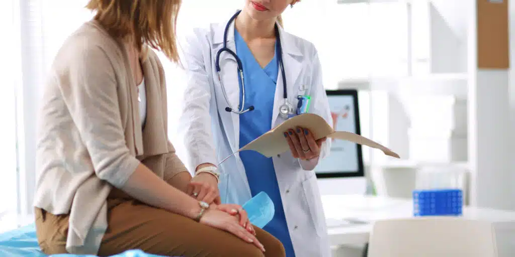 healthcare professional talking compassionally with patient - detox centers healthcare professional talking compassionally with patient - detox centers