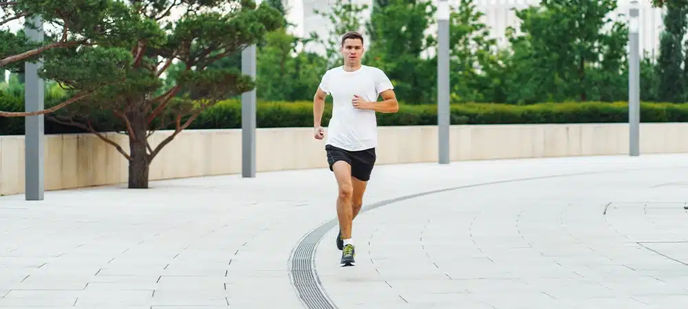 a person jogging outdoors, symbolizing exercise as a coping mechanism for withdrawal - weed withdrawal symptoms a person jogging outdoors, symbolizing exercise as a coping mechanism for withdrawal - weed withdrawal symptoms