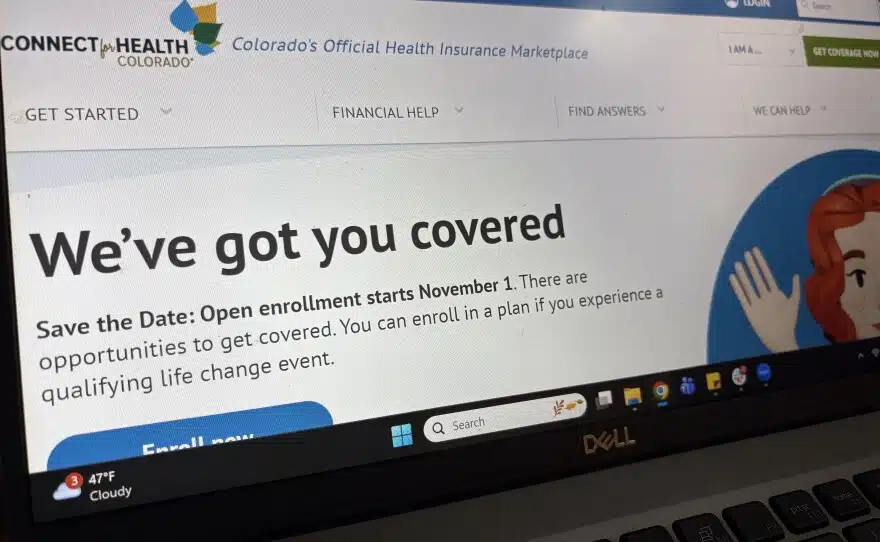 person on a laptop viewing an online insurance portal - Does my insurance cover person on a laptop viewing an online insurance portal - Does my insurance cover
