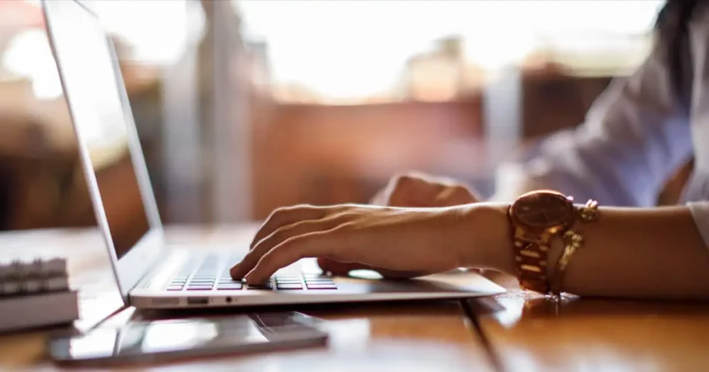 A person researching rehab options on a laptop - 14 day rehab A person researching rehab options on a laptop - 14 day rehab