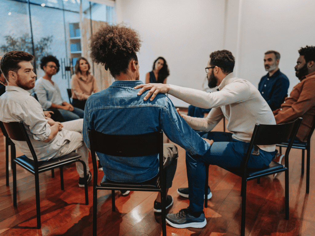Support group meeting with diverse individuals - alcohol treatment centers Support group meeting with diverse individuals - alcohol treatment centers