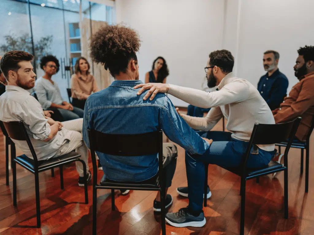 Support group meeting with diverse individuals - alcohol treatment centers Support group meeting with diverse individuals - alcohol treatment centers