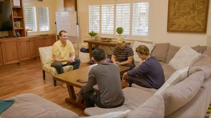 Image of a supportive group meeting in a casual setting - Long Beach rehab Image of a supportive group meeting in a casual setting - Long Beach rehab