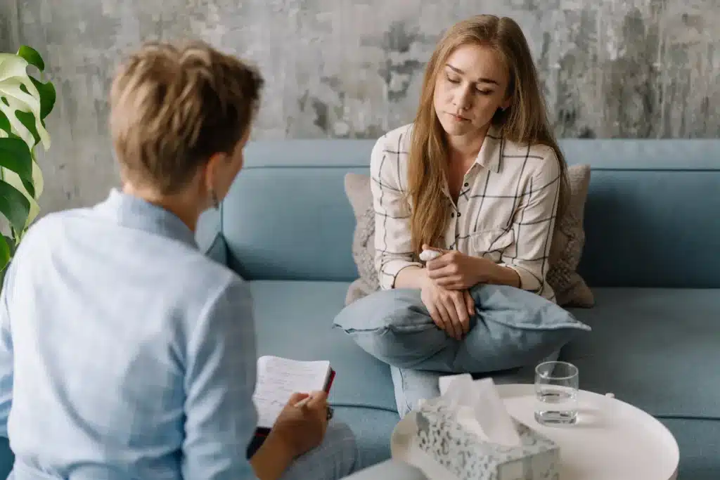 person talking with their psychiatrist - bipolar disorder 2 treatment person talking with their psychiatrist - bipolar disorder 2 treatment