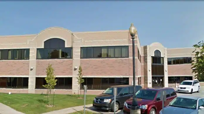 Front entrance of Winnebago County Human Services building in Neenah, Wisconsin, providing community support and health services