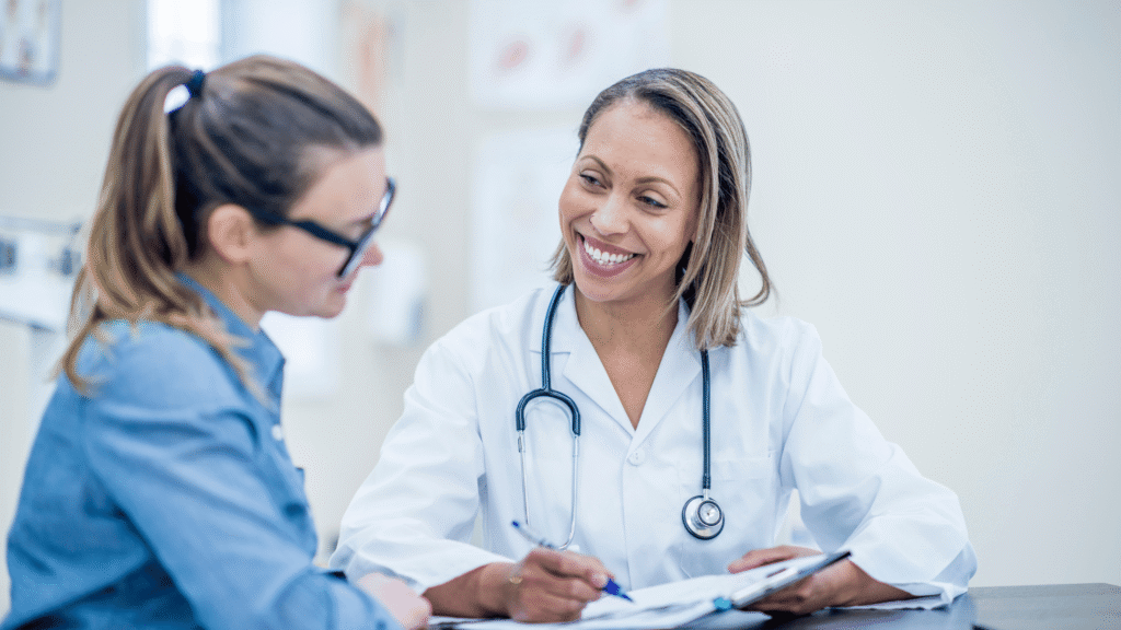 of a compassionate medical professional consulting with a patient - Sarasota detox centers